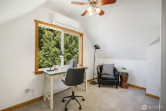 Middle bedroom - great for youngsters or guests - or an office space.