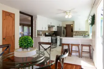 Added rustic charm and warmth with beautiful custom knotty pine doors throughout the home.