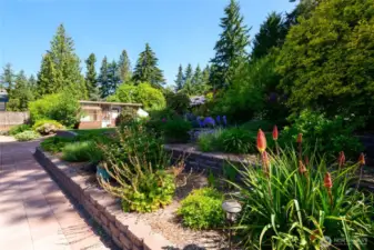 Stop to pick delicious strawberries right from your patio! The collection of curated plantings throughout the property is inspirational and beautiful.