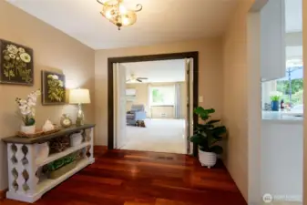 A spacious transitional area between rooms offers versatile opportunities—use it as a cozy reading nook, a stylish display gallery, or even a compact home office. It can also serve as a space for built-in storage, or a convenient coffee station to enhance both function and flow in your home.
