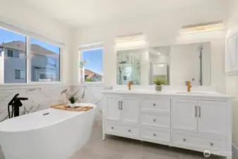 Dual vanity with tons of light in the primary bath