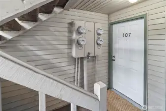 Down a half flight of stairs to a private & quiet side of the condominium complex