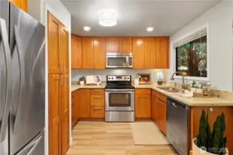 Updated Kitchen with stainless steel appliances and granite counters