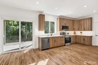 Dining Area with Door Leading to Covered Deck