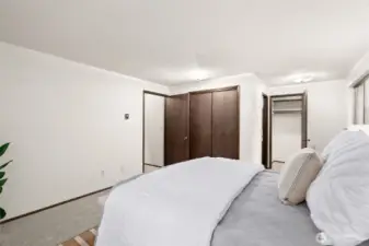 Another view of primary bedroom