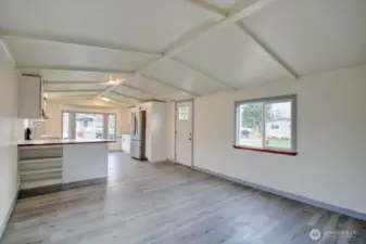 View from living room looking back towards the kitchen and front door.