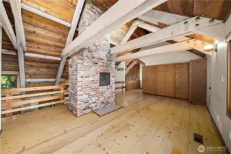 Upstairs a large open primary suite with built-in storage