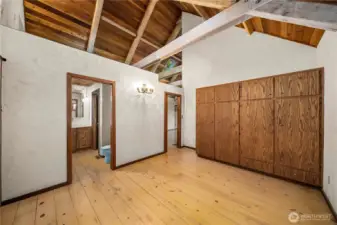 Bedroom in ADU with built ins. Add a second bedroom upstairs?