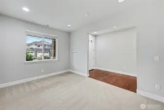 Spacious and versatile, this room is perfect as an office or hobby room, featuring a wide entrance and an abundance of natural light for a bright and inspiring space.