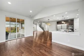 This bright space with vaulted ceilings can be utilized as a formal dining area or large breakfast nook.