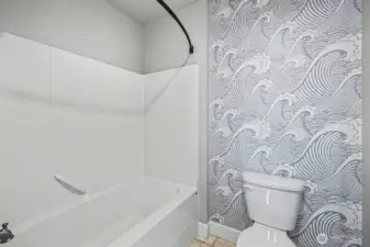 Full bath features private water closet with shower and toilet.