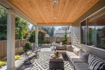 Expansive covered patio with recessed lighting for year-around enjoyment.