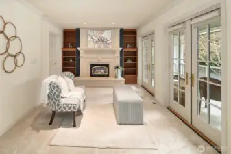 Primary Suite Sitting area with deck & FP
