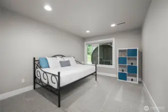 Bedroom two downstairs has lake views, a large closet and is next to downstairs bathroom.
