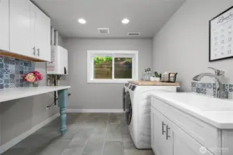 The laundry work room is downstairs.