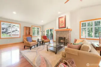 View in the living room towards the sliders to the main floor second story deck