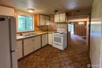 View through kitchen toward front of house
