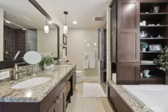 Check out those custom shelves adjacent to the Jacuzzi tub.