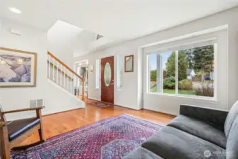 Front room with sitting area could be a good piana space.
