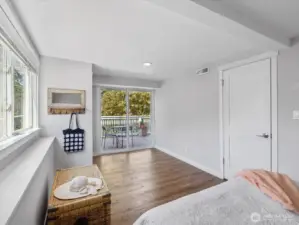 Bedroom #4 has a slider door that opens out onto lower deck, could be an excellent 2nd primary or a multigenerational suite