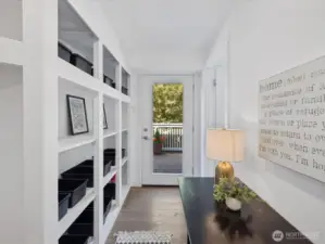 Built in storage area flanks the hallway & ads period charm