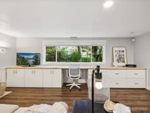 View from entrance of bedroom 5 across rec room towards massive maple work top