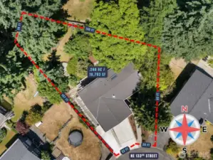 Aerial view of home with approximate boundary lines + SF / acreage