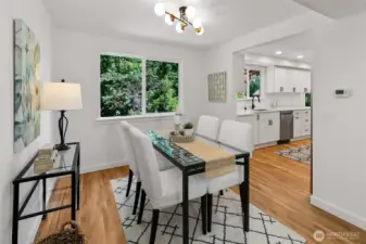 Dining room also features beautiful new hardwood floors
