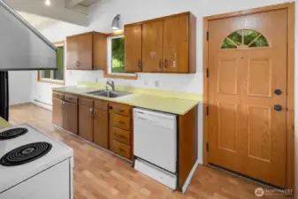 Kitchen features an exterior door to access the backyard for easy grilling and entertaining!