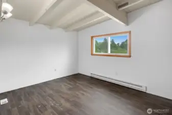 This is the largest of the three main floor bedrooms, with views to the front of the house.