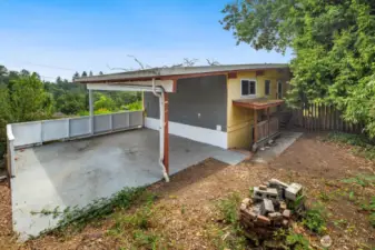 The covered patio is a great place for entertaining, or possibly the beginnings of an expansion or ADU??
