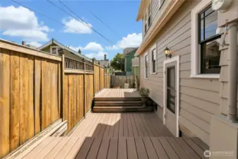 The backyard trex deck is an oasis to have BBQing and early morning coffee!