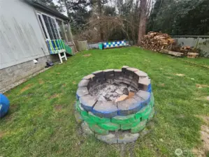 Nice sized lawn area with the firepit.