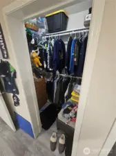 Walk-in closet in the primary bedroom.