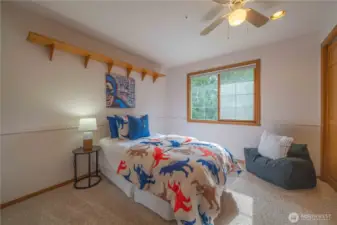 Another spacious guestroom on upper level.