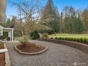 Manicured landscape and outdoor living spaces.