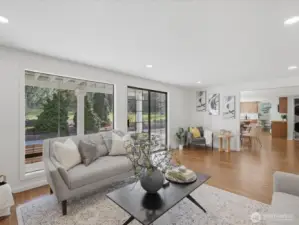 Additional family room off the eat in kitchen with cozy reading nook and an abundance of light.
