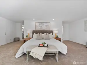 Spacious primary bedroom with room for a full seating arrangement, creating a true retreat feel. Double bathrooms and 3 closets.