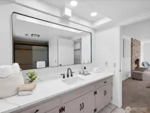 Primary 3/4 bathroom with Quartz countertop and plenty of counter space.