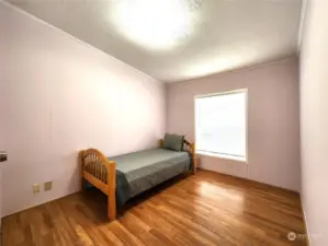Guest bedroom 3 with easy care laminate flooring