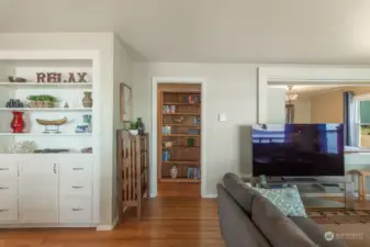 Built-ins add charm to this home that offers a view of the water from one of the bedrooms.