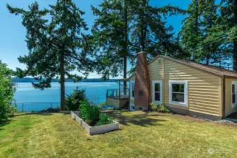 This charming home sits on an expansive large level waterfront lot.