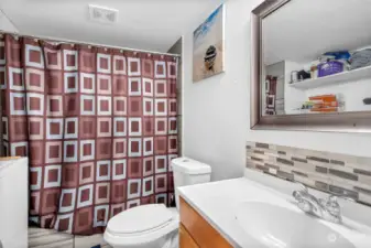 This home has one bathroom off the hallway with a functional layout.