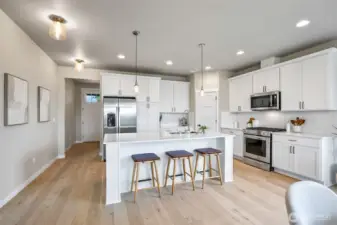 Photographs are for illustrative purposes only. Features, finishes, interior/exterior colors, landscaping and floorplan shown may vary from actual homes built.
