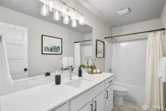 Photographs are for illustrative purposes only. Features, finishes, interior/exterior colors, landscaping and floorplan shown may vary from actual homes built.