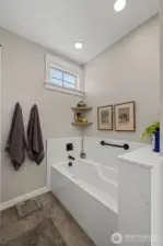 Soaking tub in the primary bathroom.