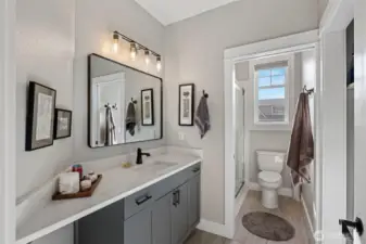 Guest bathroom/laundry is on the right.