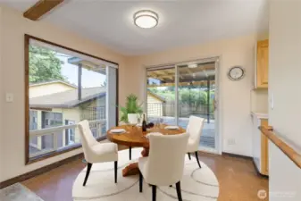 Dining room with slider to large covered deck