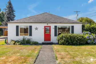 This an AI photo of the home painted white with a black trim