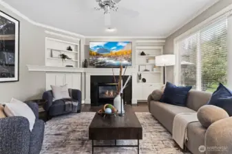 An inviting living space with backyard views creates the perfect place to relax or entertain.